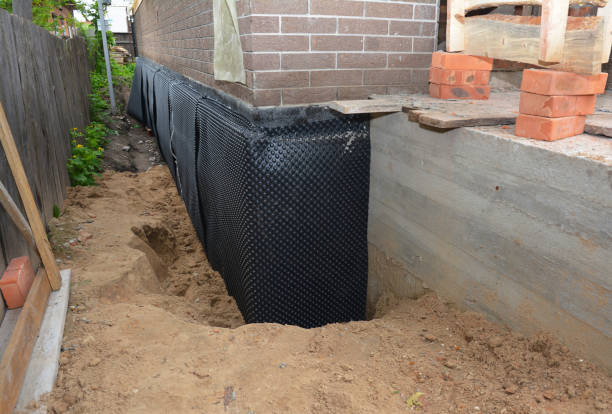 Happy homeowners after waterproofing job in Williston Park